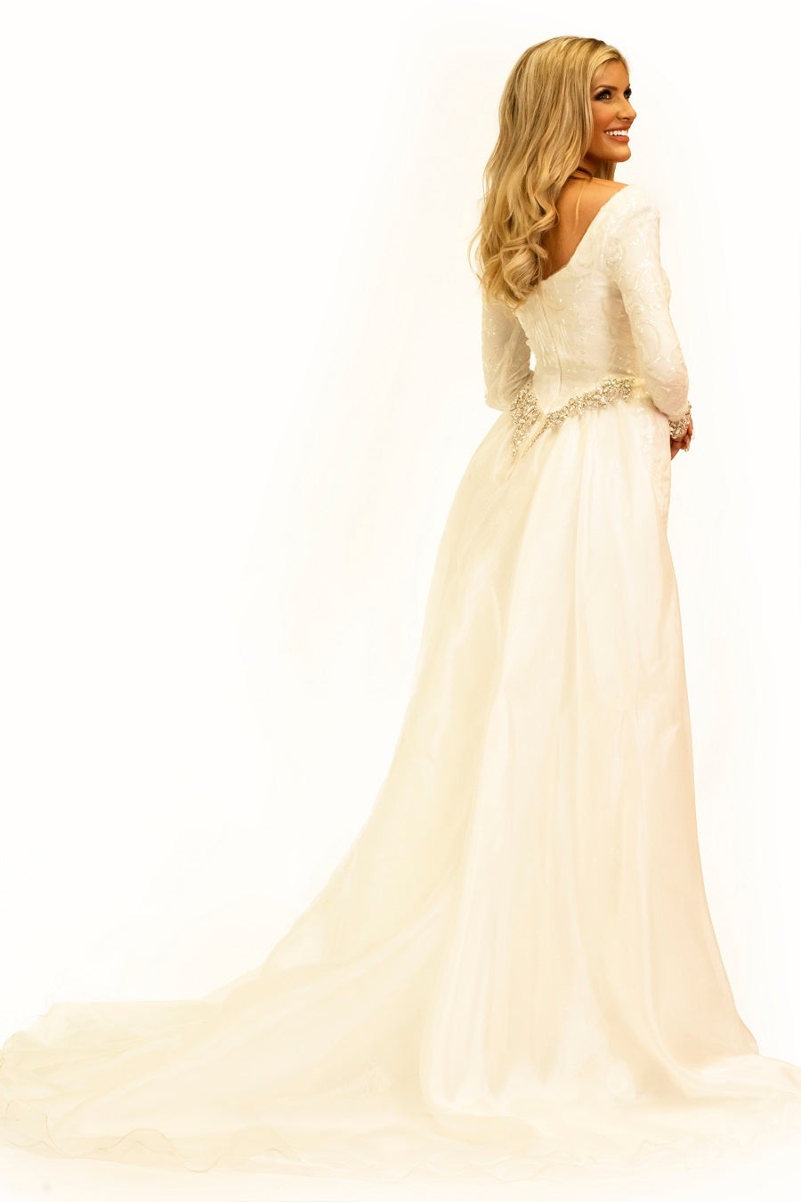 Johnathan-Kayne-2334-ivory-pageant-dress-back-long-sleeves-embellished-overskirt.