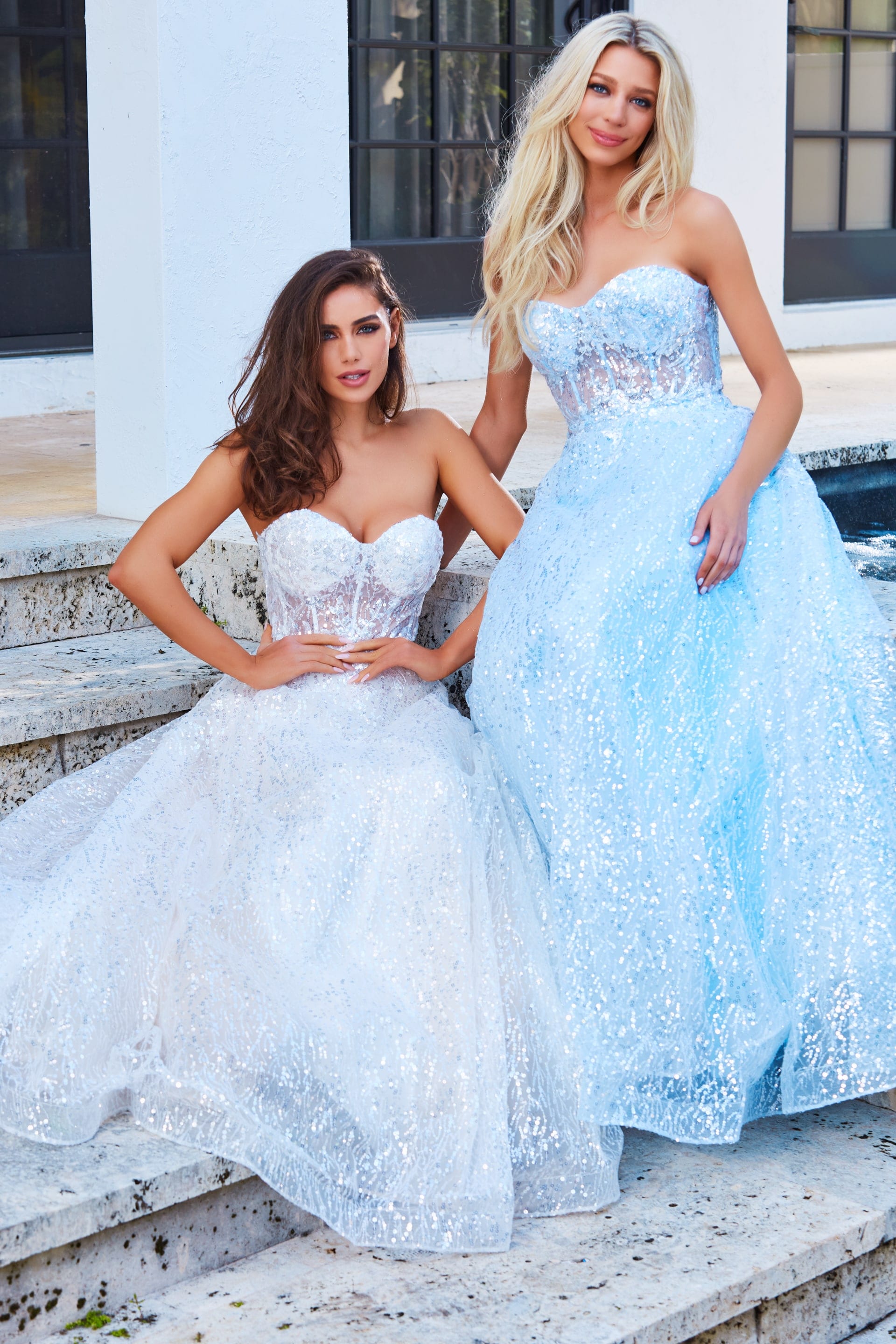 JVN08417 JVN08417 Lace Prom Dress Strapless Sweetheart Neckline Corset Bodice A Line.  The bodice on this lovely evening gown is sheer with embroidered lace. The exquisite gown has subtle sequins scattered on the long A line skirt.  