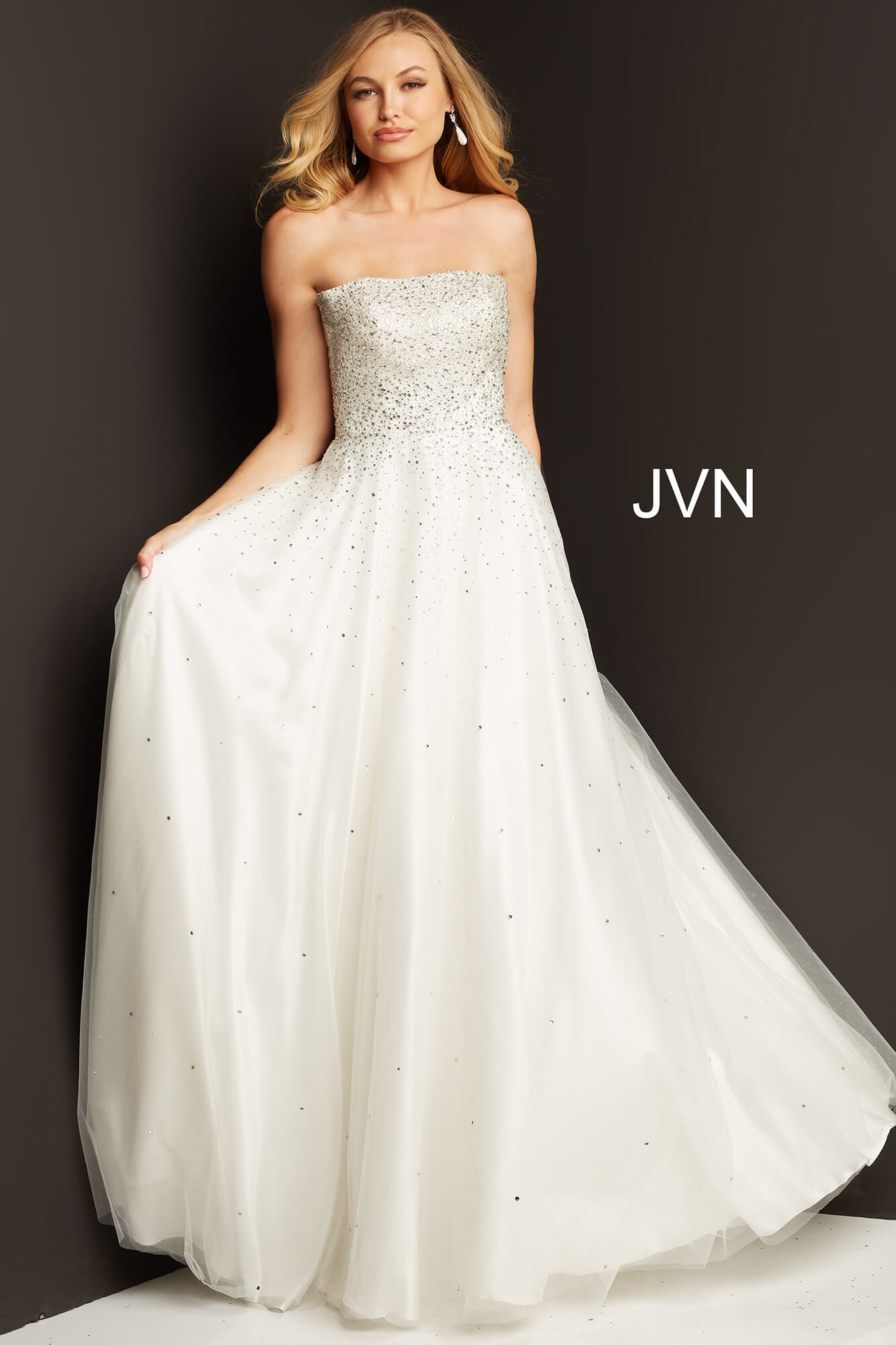 Jovani JVN65664 is a Prom Dress, Pageant Gown & simple wedding dress. Embellished tulle ballgown, fully lined, full floor length skirt, strapless bodice, straight neckline, lace up back.