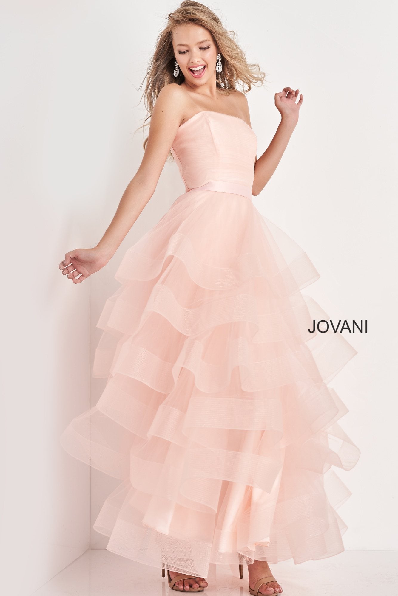Jovani Kids K02442 is a Girls Prom Dress, Kids Pageant Gown & Pre Teen Formal Evening Wear gown. Girls Long Layered Ruffle Tulle Ballgown Dress with Tulle Skirt. Straight neckline.  Available Girls Sizes: 8, 10, 12, 14  Available Colors: Aqua, Black, Pink 
