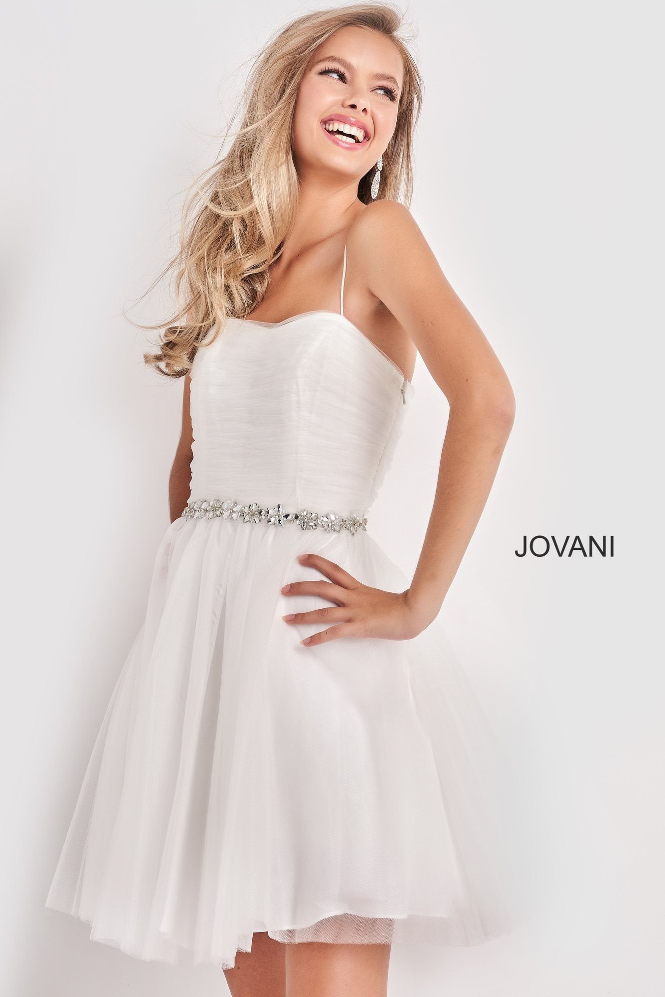 Jovani Kids k4761 is a short Girls Party Dress, Kids Pageant Gown & Pre Teen Formal Evening Wear gown. This Short Fit & Flare Girls Dress Features a sweetheart neckline with spaghetti straps. Pleated Fitted bodice with a Crystal Embellished Waist belt. Flared Tulle Short Skirt.  Available Girls Sizes: 8, 10, 12, 14  Available Colors: Light Blue, Off White