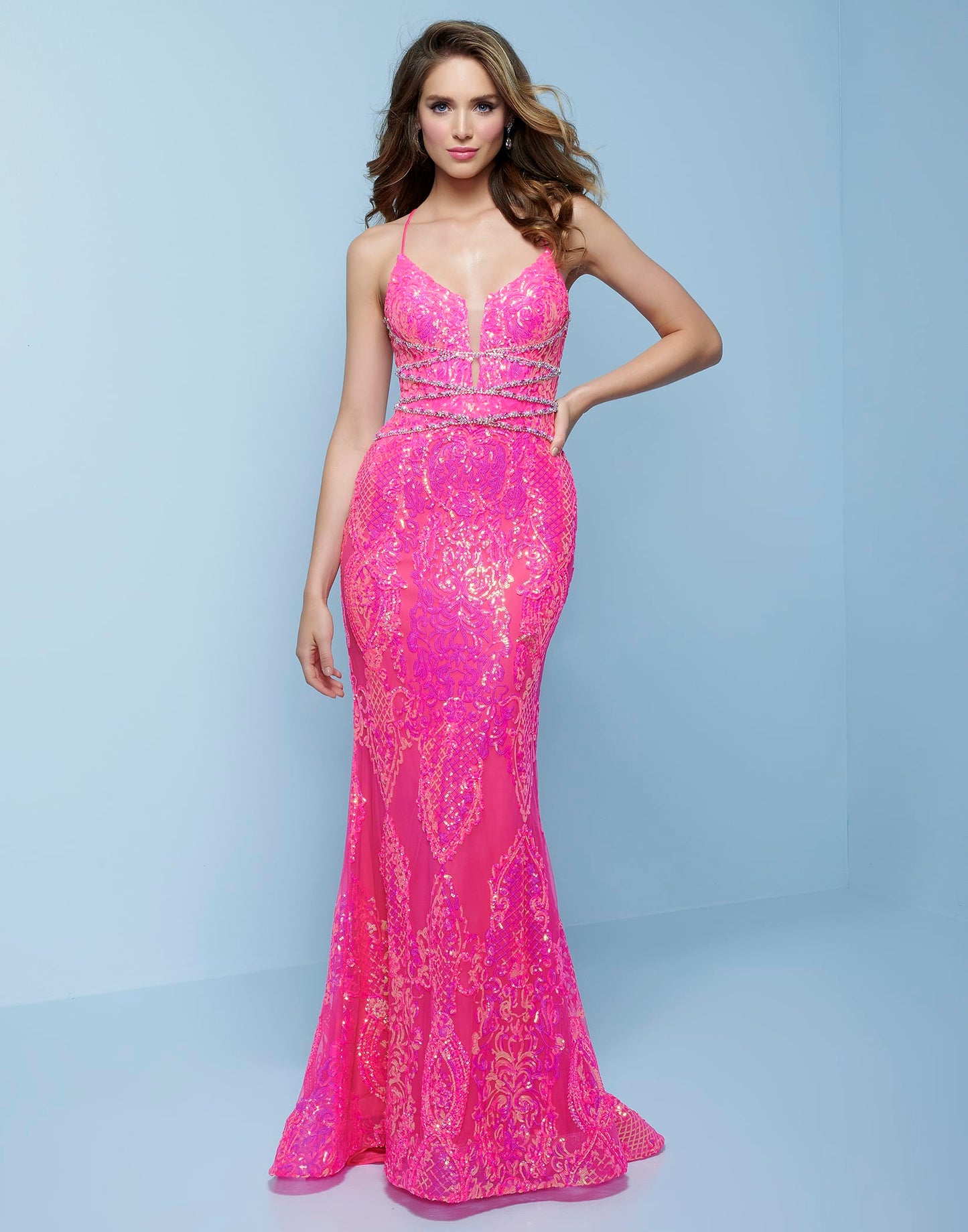 Splash Prom K526 This is a neon sequin column prom dress with low open lace up tie back.  This evening pageant gown features a plunging v neckline with criss cross beading in the front. Colors Neon Pink, Neon Blue Sizes  00, 0, 2, 4, 6, 8, 10, 12, 14, 16, 18, 20, 22, 24, 26, 28