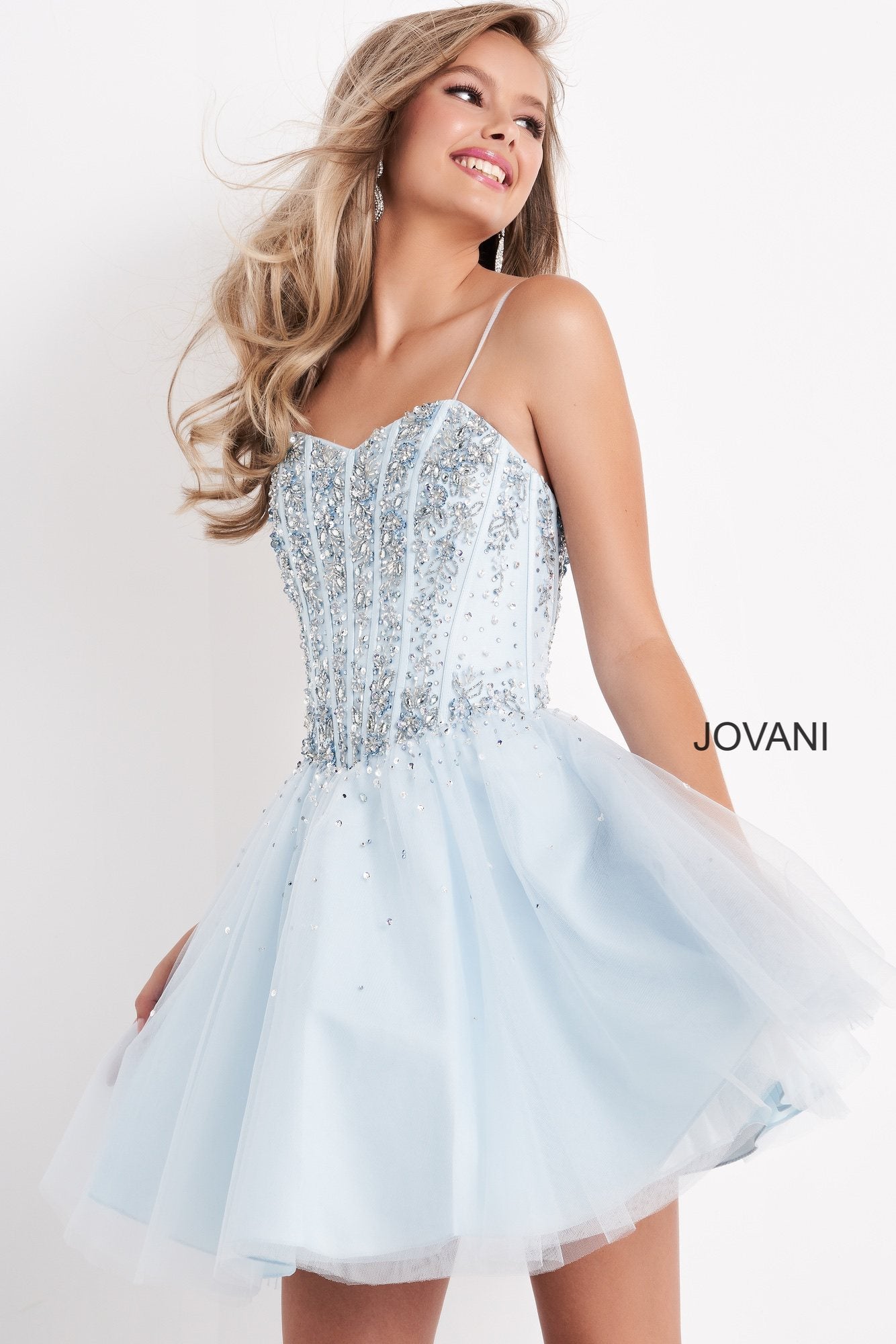 Jovani Kids k62533 is a Short Girls Prom Dress, Kids Pageant Gown & Pre Teen Formal Evening Wear gown. This Short Girls Fit & Flare Dress Features a sweetheart neckline with spaghetti straps. Embellished & Beaded Corset Bodice with boning. Embellishments cascade into the flared tulle skirt.  Available Girls Sizes: 8, 10, 12, 14  Available Colors: Black, Blue, Fuchsia, White