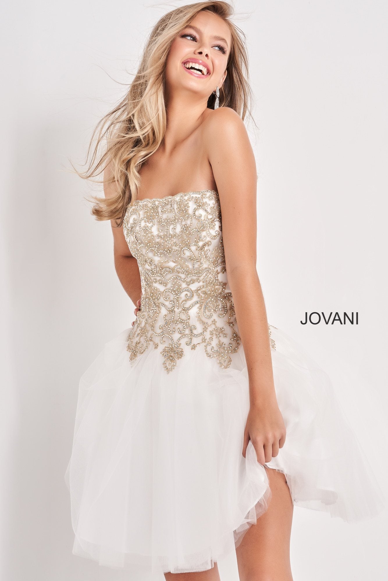 Jovani Kids k66720 is a Short Girls Party Dress, Kids Pageant Gown & Pre Teen Formal Evening Wear gown. This Strapless Straight neckline Girls Gown Features an Embellished Embroidered Applique for a stunning scallop Bedazzled Bodice with a classic look. Flared Tulle skirt.  Available Girls Sizes: 8, 10, 12, 14  Available Colors: Pale Pale Blue, White