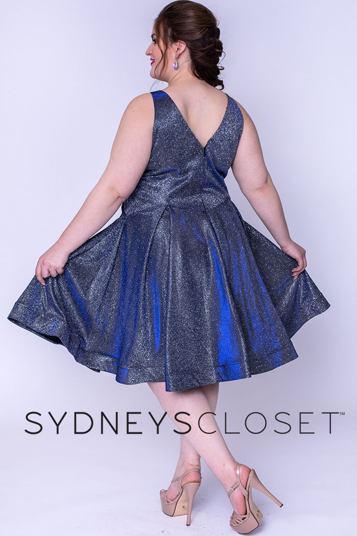 Sydney's Closet 8100 This is a super trendy plus sized V neckline holographic short formal cocktail dress that is knee length.  This short prom dress has wide straps and is bra friendly.  The homecoming dress has a basque waistline and pleated skirt with horsehair trim.  Colors  Cosmic Cobalt, Sonic Silver  Sizes  14, 16, 18, 20, 22, 24, 26, 28, 30, 32
