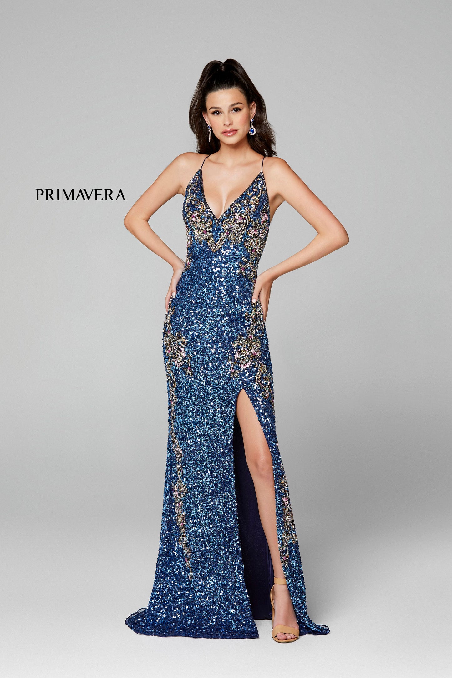 Primavera Couture 3211 is a Long fitted sequin Embellished Formal Evening Gown. This Prom Dress Features a deep V Neck with an open Corset lace up back. Beaded & embellished elegant scroll pattern accentuate curves. Fully beaded prom dress with floral pattern and side slit. Long Sequin Gown featuring a v neckline. slit in the fitted skirt, Slit in Thigh. Stunning Pageant Dress, Prom Gown & More!