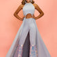 Sugar Kayne by Johnathan Kayne C131 Girls and Preteens pageant high neckline sleeveless stretch ponte knit long jumpsuit. The neckline is embellished and the pants legs are layered in shiny fringe.  There is a cutout at the waistline and a long cape that flows into a sweeping train.  Available colors:  Ice Blue, Pink, White  Available sizes:  2, 4, 6, 8, 10, 12, 14, 16