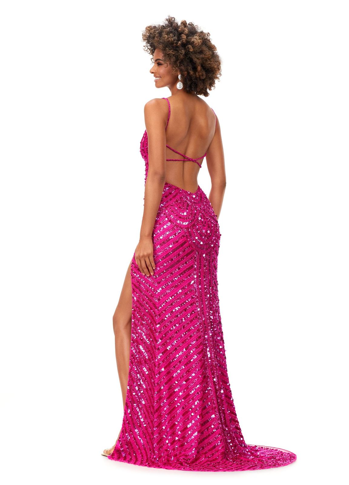 Ashley Lauren 11363 This stunning gown is hand beaded with sequins in an intricate, detailed pattern. Featuring an open back and spaghetti straps, the dress is complete with a left leg slit. Sweetheart Neckline Spaghetti Straps Open Back Left Leg Slit COLORS: Hot Pink, Red, Black, Gold