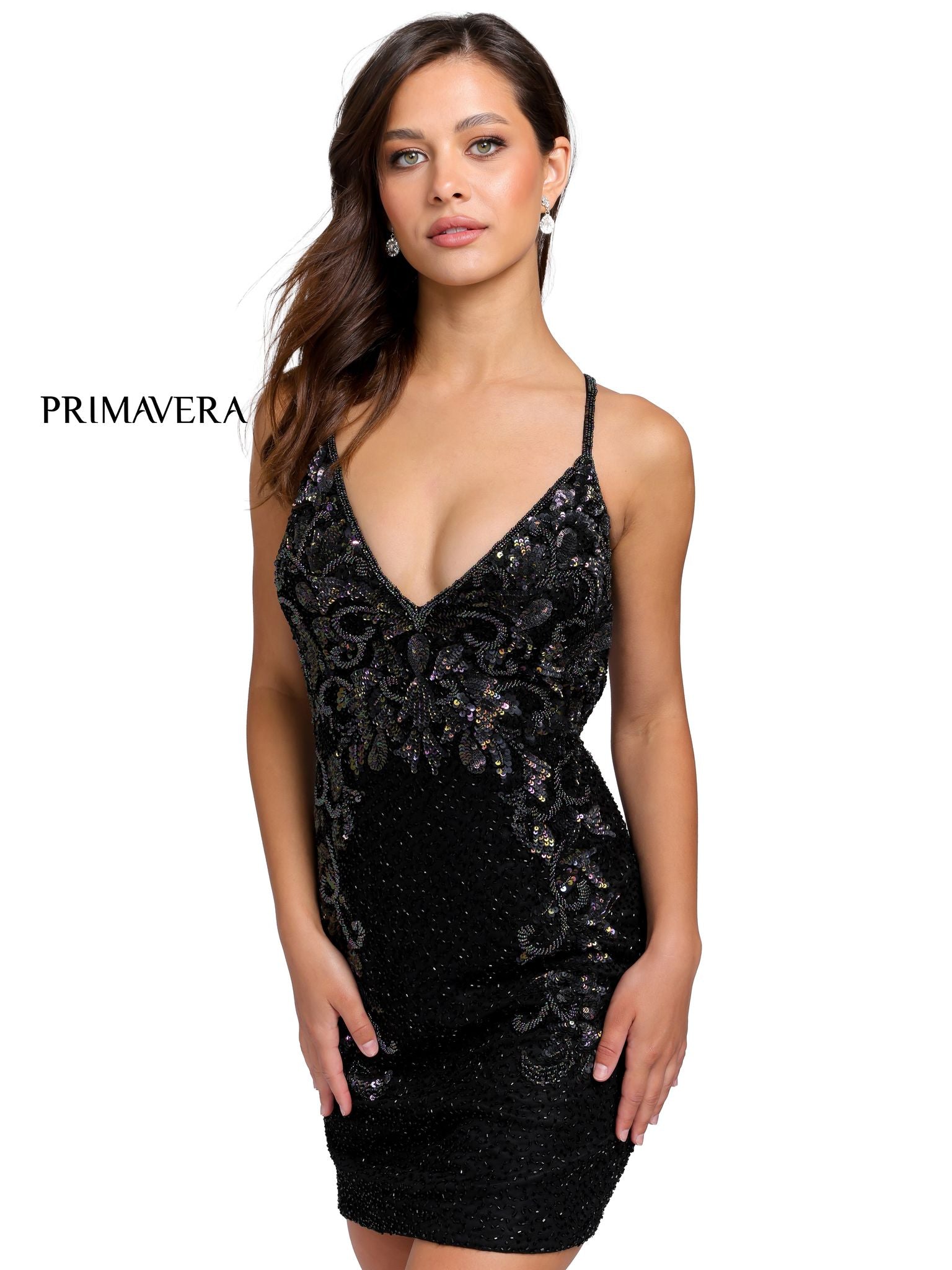 Primavera Couture 3516 Cocktail Dress. This homecoming dress has a v neckline with double cross straps in the open back It is short, fitted, and the fabric is sequins. The back has multiple straps that come together in a beautiful backless fashion.  This would make an excellent reception dress in Ivory.   Available colors:  Black  Available sizes:  2