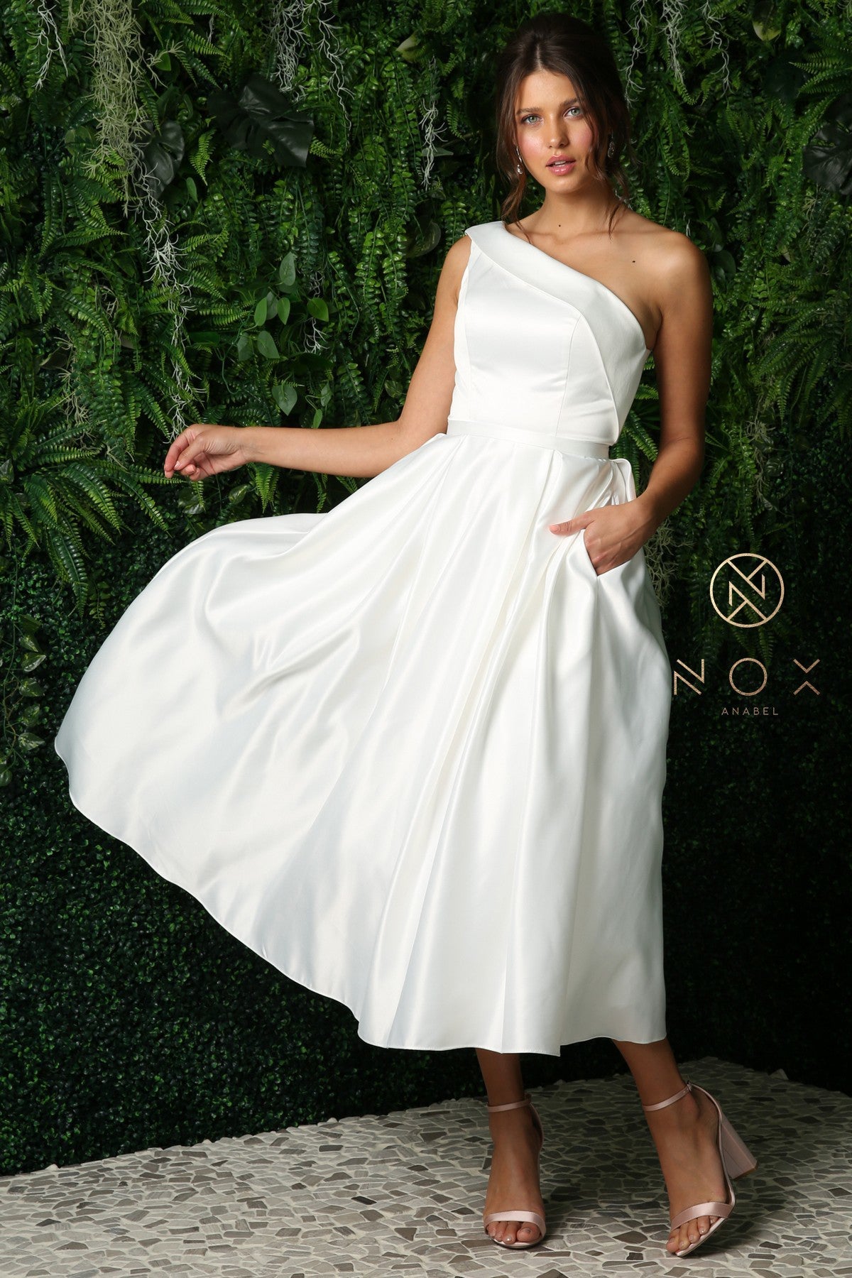 Nox Anabel 931 Short Fitted One Shoulder destination bridal gown. Tea Length Reception Formal Wedding Dress. This Party Gown has Pockets.   Occasions: Cocktail Party, Bridesmaids, Rehearsal Dinner, Prom, Red Carpet, Wedding Guest, Military and Marine Ball, Evening Wear, Formal Gown, Girls' Night Out