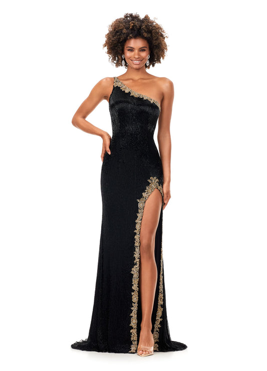 Ashley Lauren 11352 This liquid beaded gown features a one shoulder neckline with crystal trim and a left leg slit. The look is complete with a sweep train. One Shoulder Crystal Details Sweep Train Liquid Beaded COLORS: Periwinkle, Ivory, Black, Red