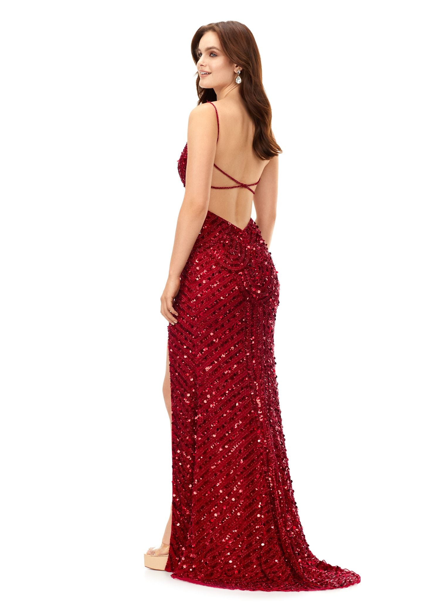 Ashley Lauren 11363 This stunning gown is hand beaded with sequins in an intricate, detailed pattern. Featuring an open back and spaghetti straps, the dress is complete with a left leg slit. Sweetheart Neckline Spaghetti Straps Open Back Left Leg Slit COLORS: Hot Pink, Red, Black, Gold