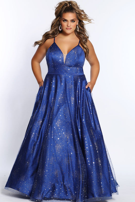 Sydney's Closet SC7326 Fabulous design details of this prom dress features adjustable spaghetti straps into a lace-up back with modesty panel keeps you supported all night. Bold in Blue and Purple, the tulle over satin skirt covered with silver stars, moons, and glitter will sparkle with every twirl. Complete with pockets! 
