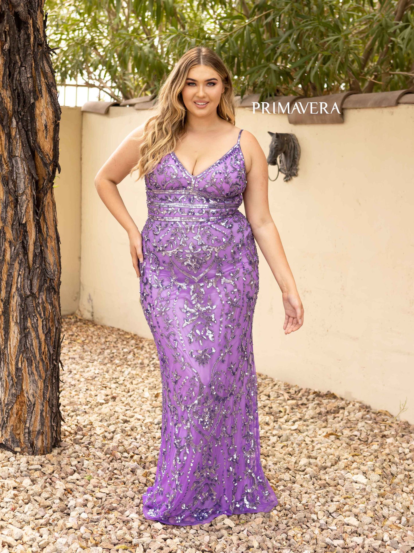 Primavera Couture 14001 Curvy Prom, Pageant and Formal Dress.  This is an all sequins plus gown with a v neckline with rows of horizontal beading at the waistline to define the waist and show your curves. lilac