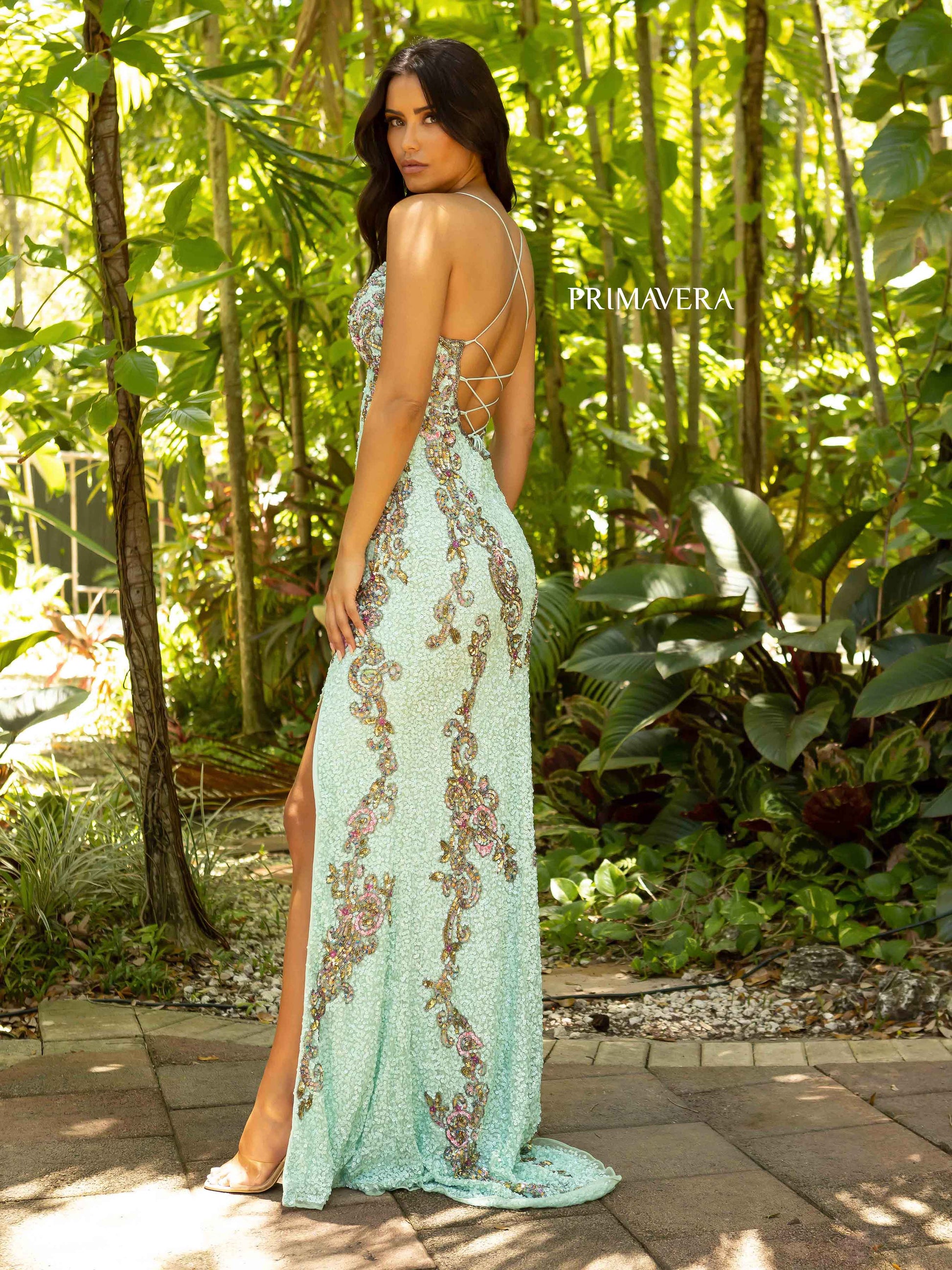 Primavera Couture 3211 Mint Green is a Long fitted sequin Embellished Formal Evening Gown. This Prom Dress Features a deep V Neck with an open Corset lace up back. Beaded & embellished elegant scroll pattern accentuate curves. Fully beaded prom dress with floral pattern and side slit. Long Sequin Gown featuring a v neckline. slit in the fitted skirt, Slit in Thigh. Stunning Pageant Dress, Prom Gown & More! back