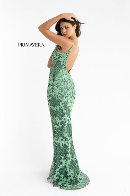 Primavera Couture 3433 is a long fully hand beaded Prom Dress, Pageant Gown, Wedding Dress & Formal Evening Wear gown. The Prom Dress has a plunging neckline with mesh panel and a long fully beaded, embellished straight skirt. It is perfect for a pageant gown or evening dress. 