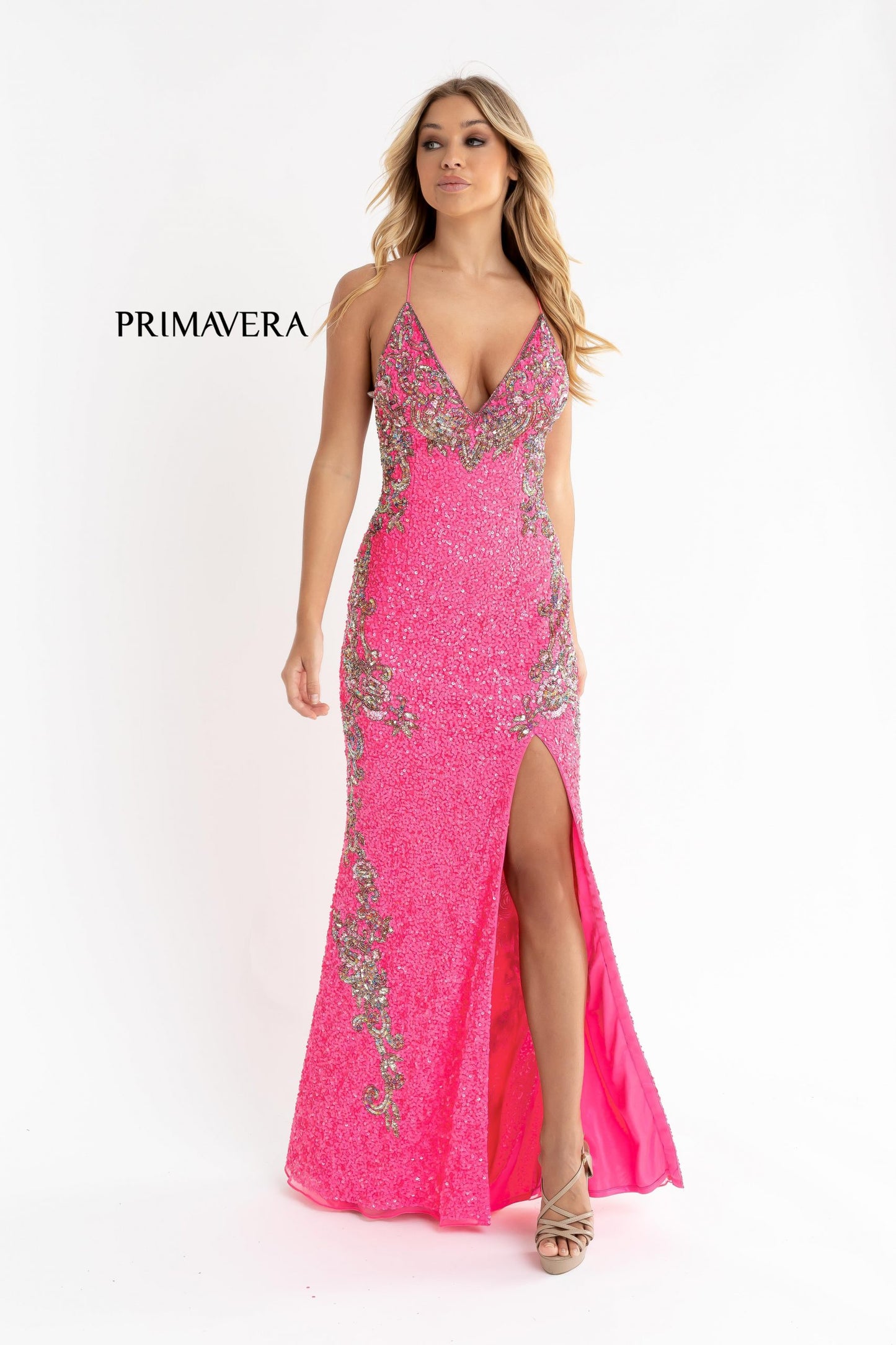 Primavera Couture 3211 is a Long fitted sequin Embellished Formal Evening Gown. This Prom Dress Features a deep V Neck with an open Corset lace up back. Beaded & embellished elegant scroll pattern accentuate curves. Fully beaded prom dress with floral pattern and side slit. Long Sequin Gown featuring a v neckline. slit in the fitted skirt, Slit in Thigh. Stunning Pageant Dress, Prom Gown & More!