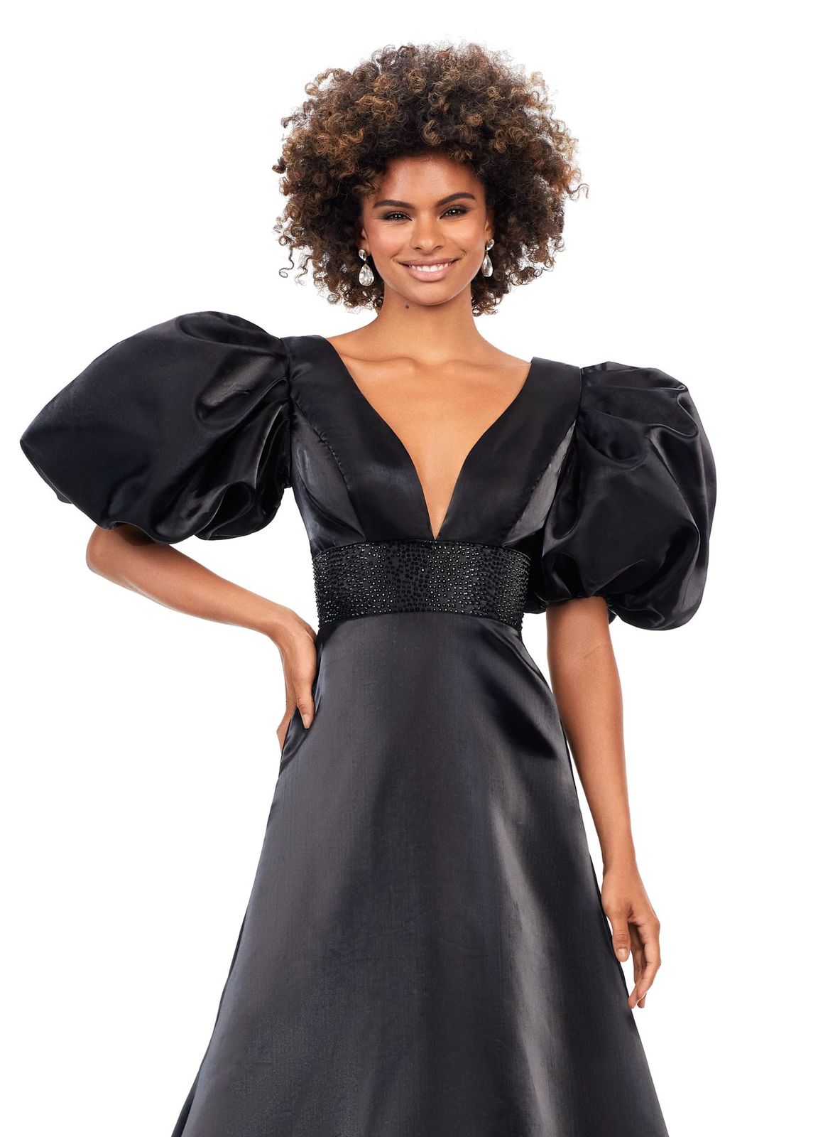 Ashley Lauren 11378 This elegant a-line gown features a heat set detailed waistband and oversized puff sleeves. With a v-neckline and v-back, this gown is the perfect mesh of elegant and fun! V-Neckline Oversized Puff Sleeves A-Line Skirt Shimmer Satin COLORS: Black, Red, White