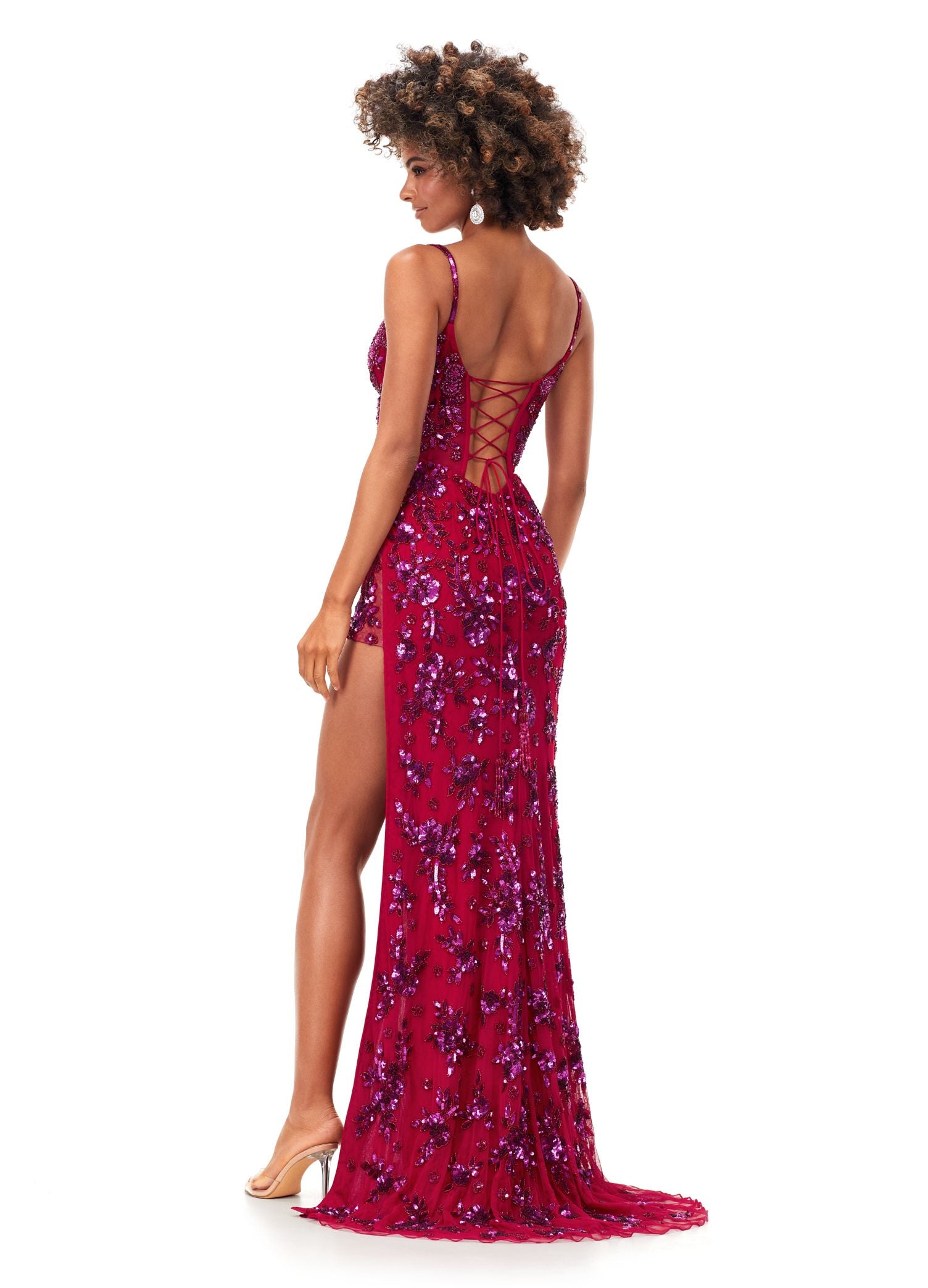 Ashley Lauren 11360 This floral beaded gown features a corset bustier with plunging v-neckline. The look is complete with a fitted skirt with high left leg slit. Sweetheart Neckline Corset Bustier Lace Up Back Left Leg Slit COLORS: Ivory, Blush, Gold/Black, Peacock, Fuchsia/Red