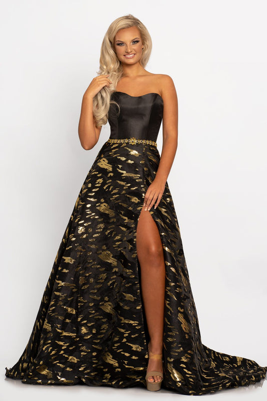 Johnathan Kayne 2232 This unique prom dress has a modified sweetheart neckline on a strapless design top with an open lace up tie corset in the back.  The print A line skirt on this evening gown is made of metallic organza burnout with a side slit Colors  Black/Gold, White/Multi  Sizes  00, 0, 2, 4, 6, 8, 10, 12, 14, 16