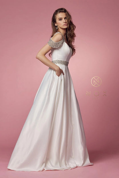 Nox Anabel R224W Long Satin A Line Ballgown Pockets Off the shoulder Dress Pageant prom Bridal Gown sweetheart neckline with beaded embellished cold shoulders strap and waistband. The open back has a zipper closure while the skirt reveals a pleated detail and flows into a full length A-line silhouette 