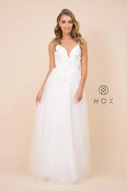 Nox Anabel R346 Long A Line 3D Floral Lace Wedding Dress Bridal Gown. Sleeveless, 3D Floral Appliques, Rhinestones, Illusion Inset, Spaghetti Straps, Embroidery, Mid-Open Back, Back Zipper, Sweep Train 3-dimensional floral appliques and shimmering jewels, this ensemble shows a deep v-neckline with an illusion inset. The back is designed with a mid-open accent as trailing embroidered details trail from the waist. The ethereal A-line skirt softly flutters into a full-length hemline. 