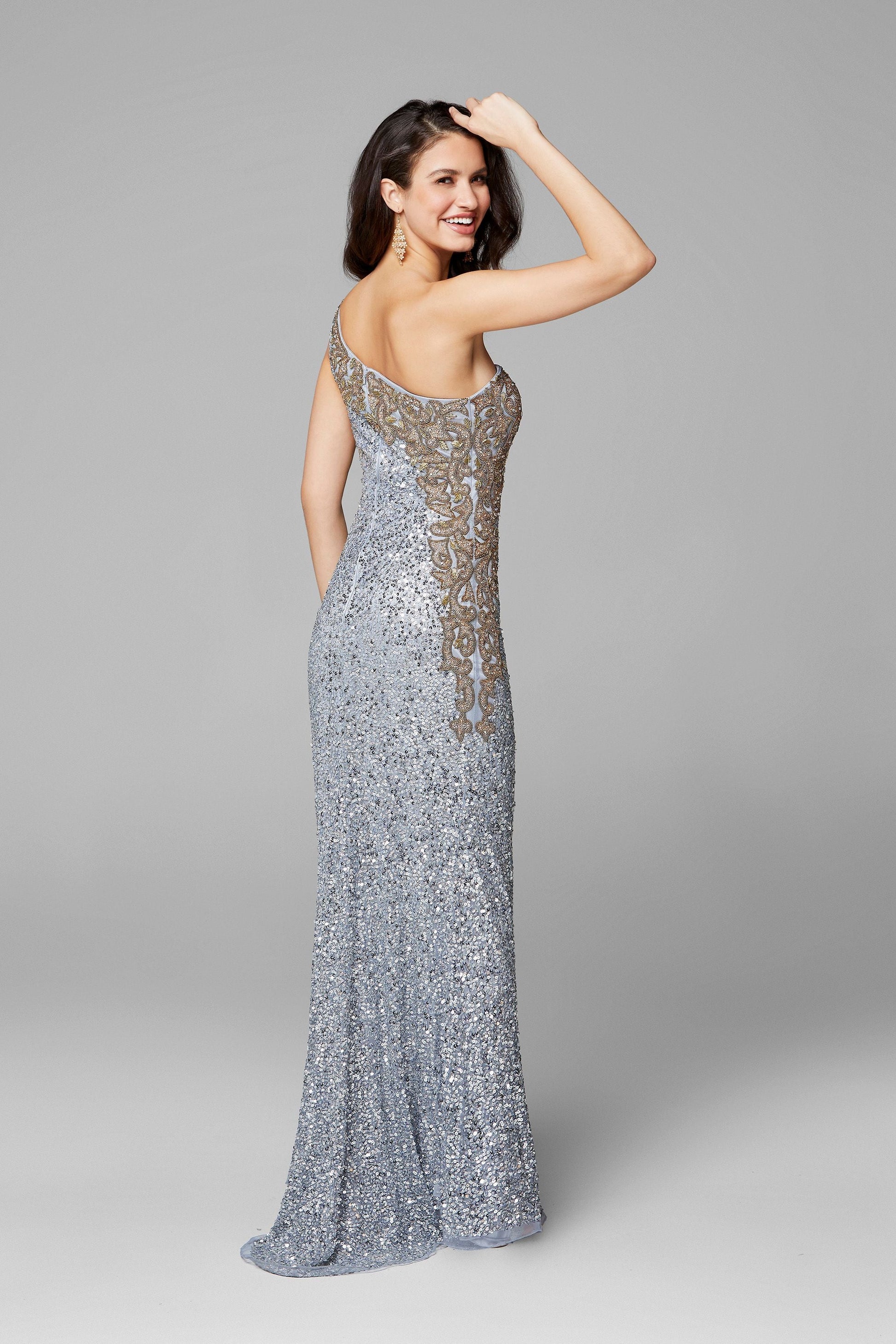 Primavera Couture 3637 is a stunning Long Fitted Sequin Embellished Formal Evening Gown. This One Shoulder Prom Dress Features Beaded Embellishments cascading from the one shoulder neckline down the side of the gown along the hip. Slit in skirt with a sweeping train. Great Pageant Formal Style.  Available Sizes: 00,0,2,4,6,8,10,12,14,16,18  Available Colors: Black, Platinum/Gold, Red