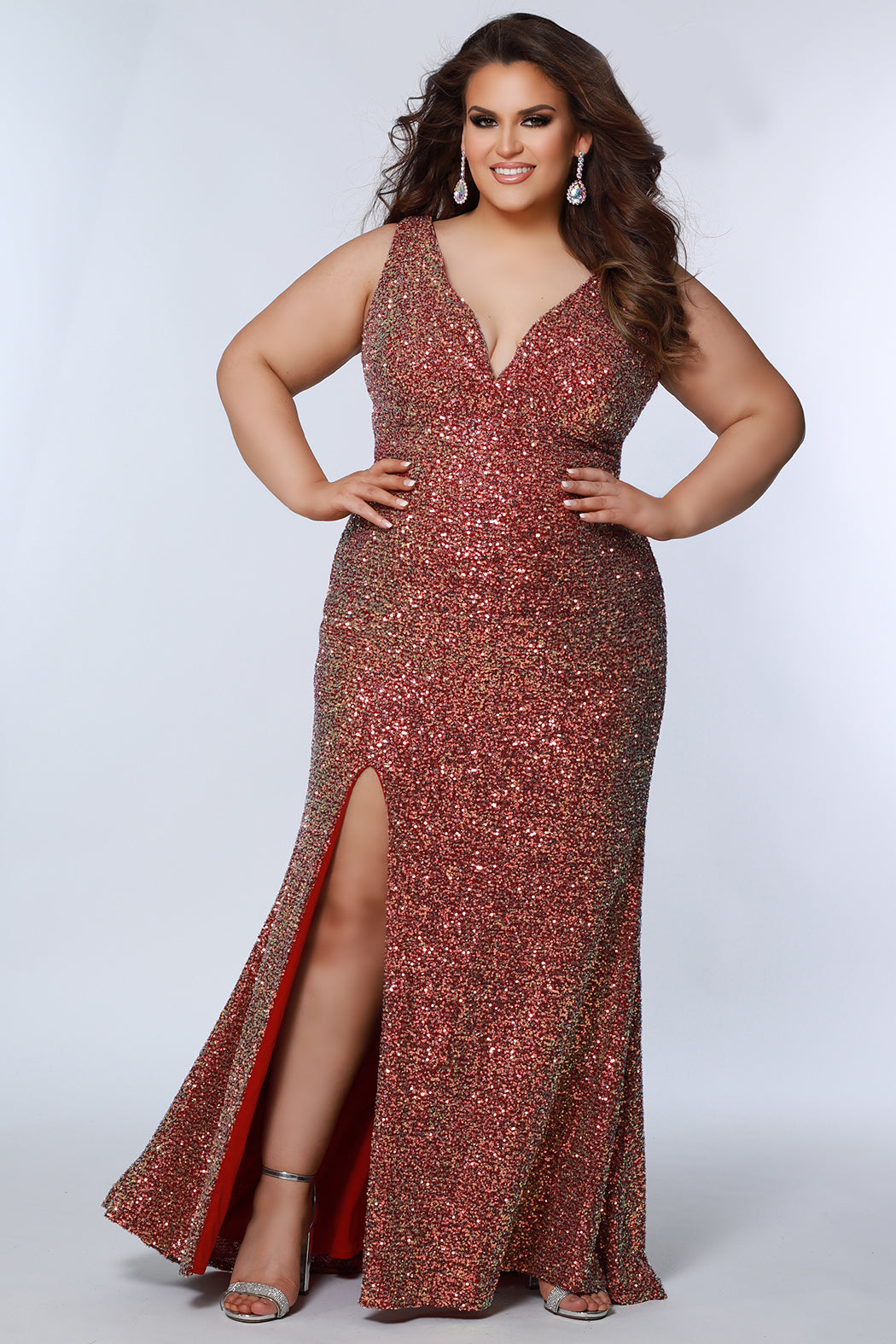 Treat yourself to a little elegant vibes in Sydney's Closet SC7339 Sleeveless Plus-Sized Prom Dress! With a V-Neckline and long-gown silhouette, you’re sure to be a showstopper. And, with a slit added to the mix, you're sure to be doin' the most on the dance floor. Puttin' on the glitz has never been so easy!