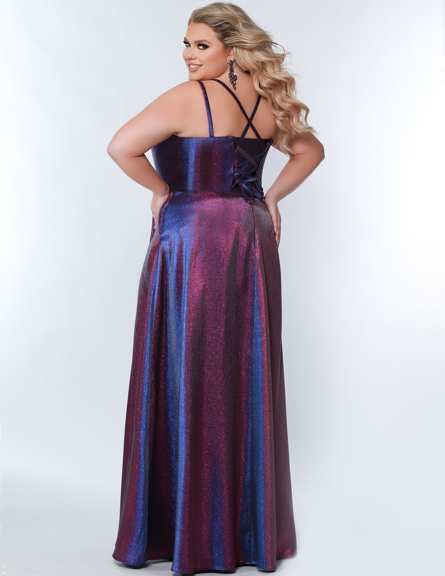 Sydney's Closet SC7344 prom dress delivers a modern and romantic look with its shimmer satin fabric, scoop neckline, A-line silhouette, and corset bodice with side slit. Perfect for making a statement on special occasions.  SC7344