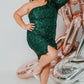 Sydneys Closet SC8112 Plus size Sequin One Shoulder Long Sleeve Cocktail Dress Formal Gown Colors: Hunter Onyx, Pearlescent, Ruby, Sapphire Size availability: 14-32 Fitted/Slim Silhouette Natural waistline One-shoulder Long sleeve Scoop neckline Slit on skirt Paillettes on stretch net Stretch knit lining