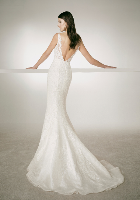 White One Bridal CHRIS is a long Lace Fitted Mermaid wedding Dress. Featuring a Plunging V neckline and sheer lace straps.  IN STOCK FOR IMMEDIATE DELIVERY  US SIZE 10 - OFF WHITE