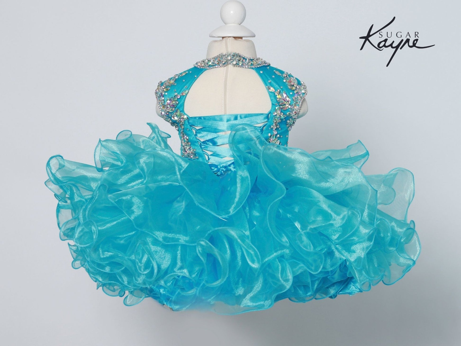 Sugar Kayne C207 Short Cupcake High Neckline Pageant Dress Girls Corset Ruffle Skirt  Sizes: 0M, 6M, 12M, 18M, 24M, 2T, 3T, 4T, 5T, 6T  Colors: Grape, Hot Coral, Electric Blue