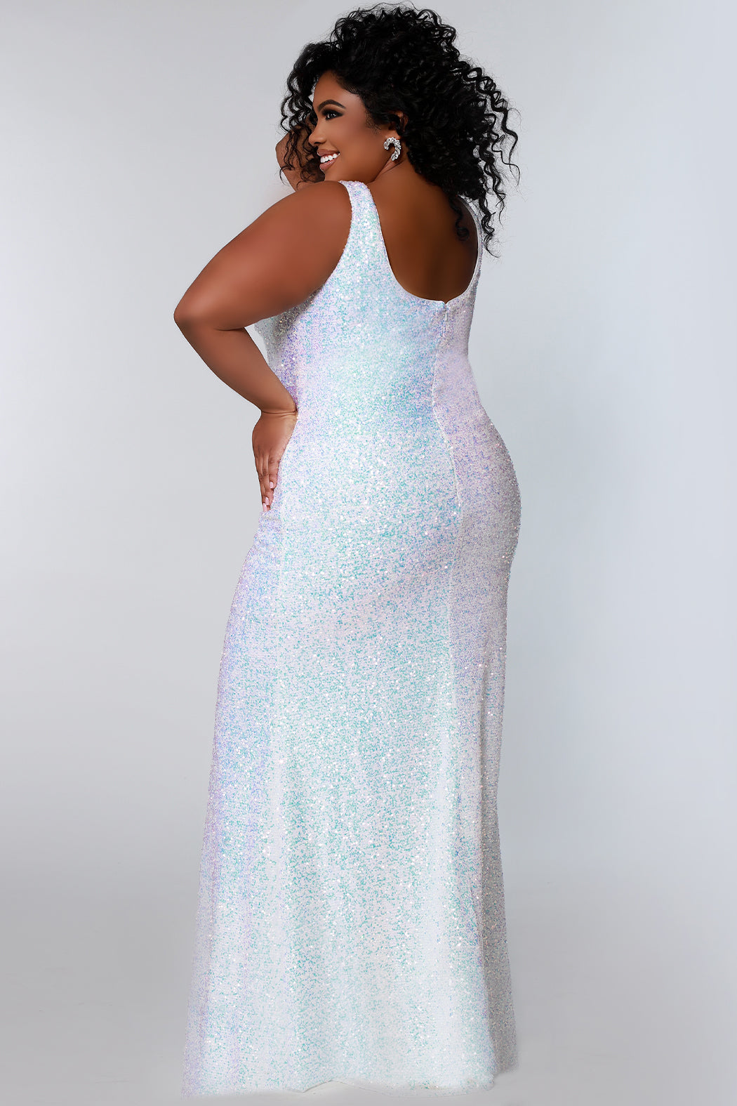 Tease Prom TE2201 Sydneys Closet Long Fitted Sequin Plus size prom dress slit  Colors: Aqua, Peach, Unicorn Size Availability: 14-28 Fitted silhouette V-neckline Pleated bodice Empire waistline Slit on right side of skirt 5 inch sweep train Bra-friendly straps Invisible zipper Scoop back Multi-dimensional sequins Stretch knit lining