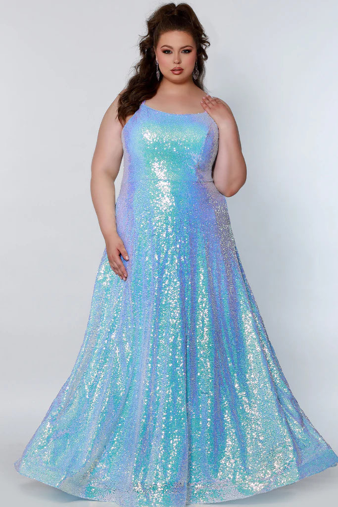 Sydney's Closet TE2208 Long Sequin A Line Plus Size Prom Dress Pockets Formal Gown  Colors: Arctic Frost, Polar Purple, Peacock Size Availability: 14-32 A-line silhouette Scoop neckline Double ½ inch straps in sequins Pockets A-line skirt Natural waist Horsehair hem Multi-dimensional sequins Stretch knit lining