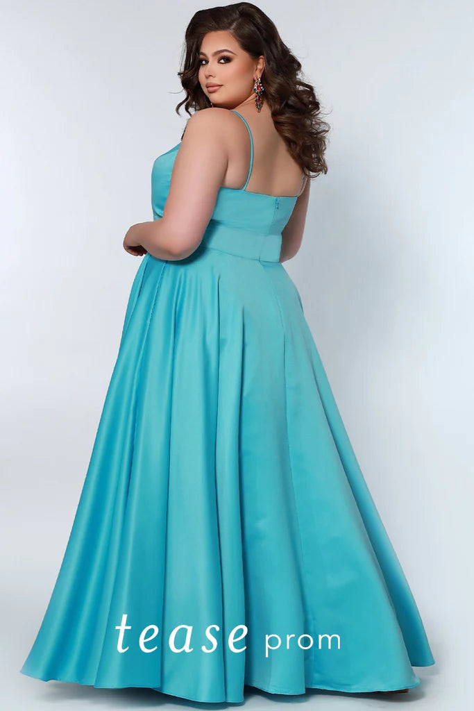 Sydney's Closet TE2209 Long A Line Plus size Satin Prom Dress Slit Skirt Pockets Formal Gown  Colors: Coral, Lilac, Mint, Sky Size Availability: 14-32 A-line silhouette Pockets Deep V-neckline Mesh insert to match satin 4.5 inch mesh insert Spaghetti straps  Slit starts at 17 inches from waist Center back zipper Fully lined