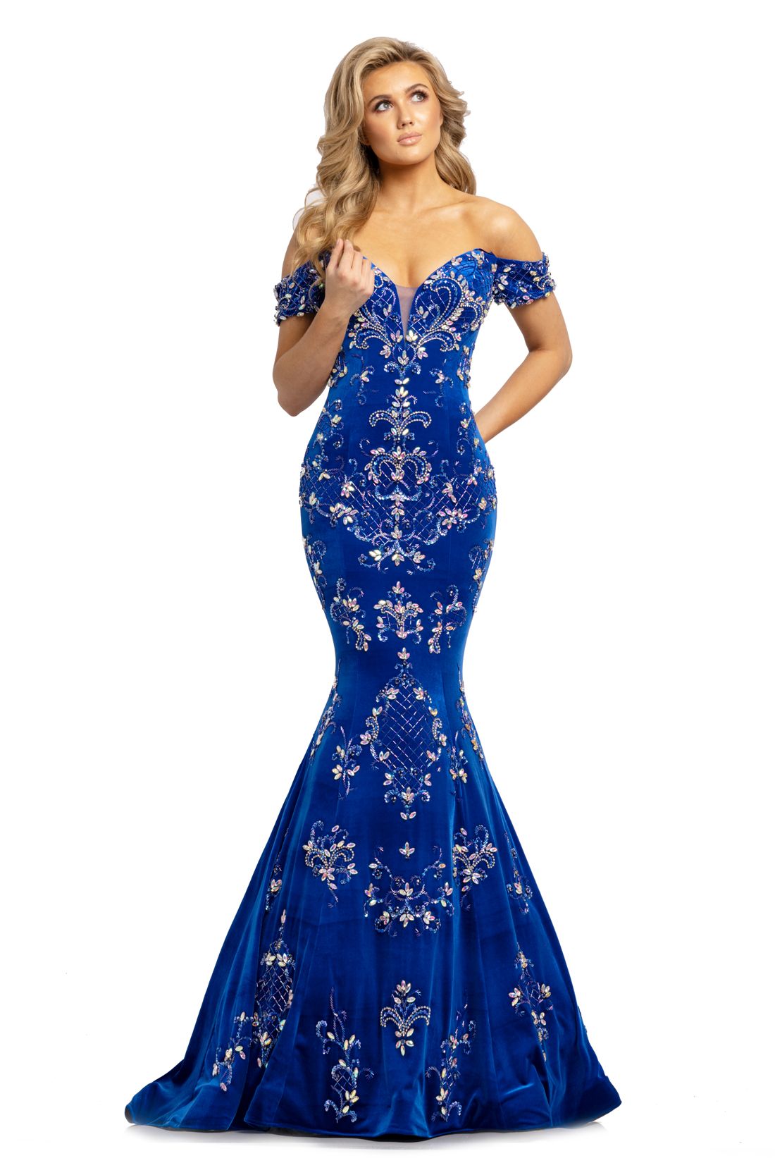 Johnathan Kayne 2176 is a long fit & Flare Mermaid Silhouette Crushed Velvet Formal Evening Gown. This Pageant Dress Features Crystal embellished off the Shoulder sleeves and a sweetheart Plunging neckline. Lush Trumpet skirt with sweeping train. Bodice is embellished with hand beading and crystal rhinestones. Prom Dress Evening Gown   Available Colors: Periwinkle, Royal, Black  Available Sizes: 0-16