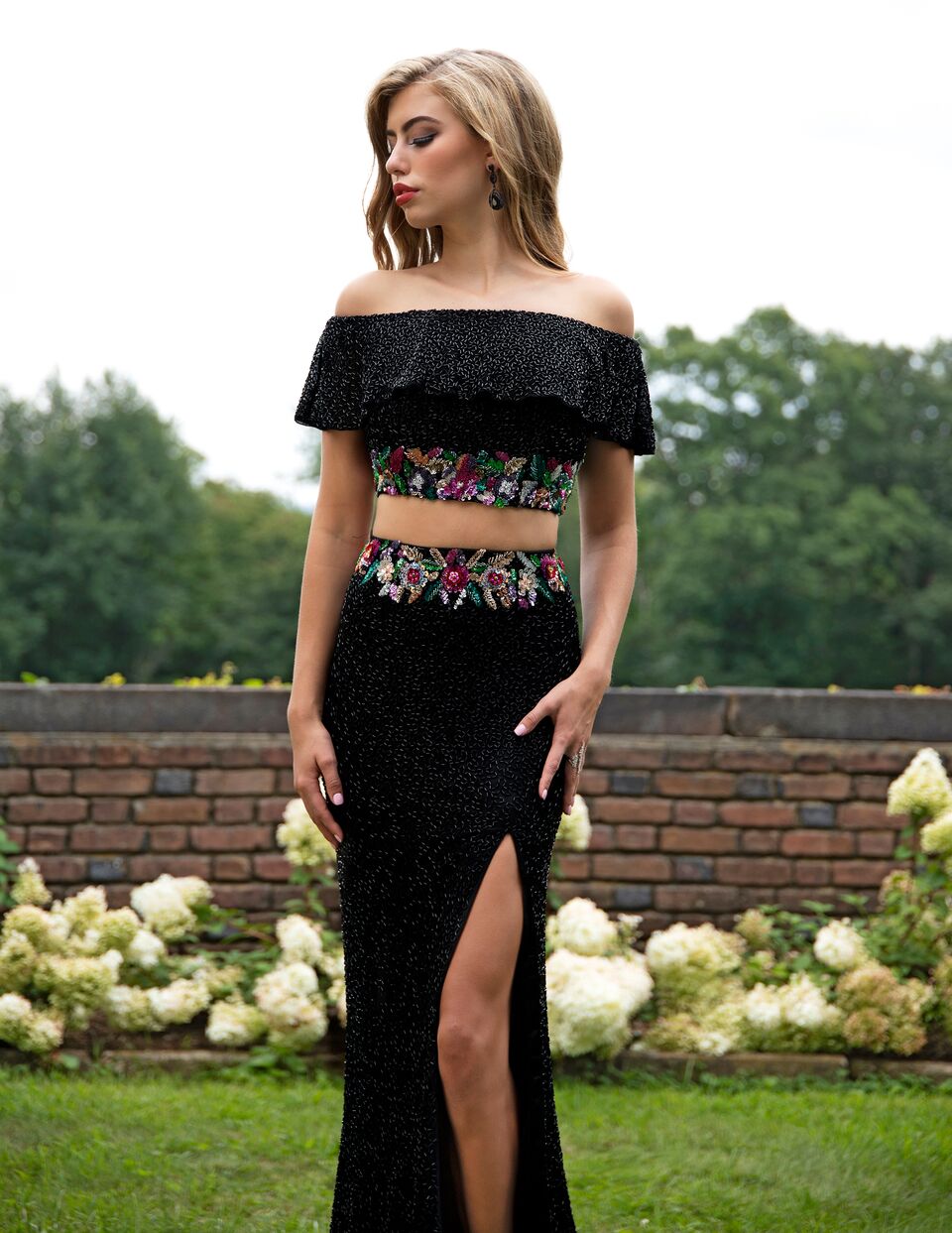 Primavera Couture 3215 Black Size 16 Prom Dress Pageant Gown  A two piece beautiful prom gown with off the shoulder boho beaded ruffle sleeves and a beaded floral design waistline with a side slit. 