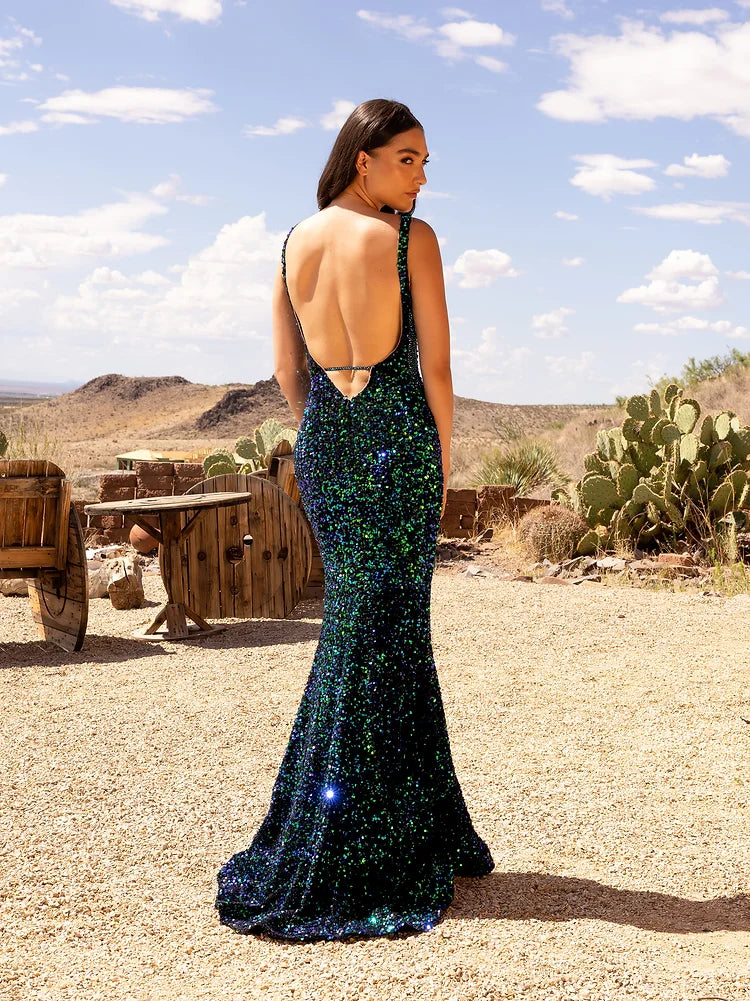 Vienna Prom Dress 8853 Long Sequin Prom Dress Fringe Slit Backless Crystal Sheer Formal Gown Vienna Prom Dress 8853 Sequined Evening Gown with a V Neckline and a Slit with Fringe at the Top  Sizes: 00-16  Colors: Emerald, Lt. Multi, Pink