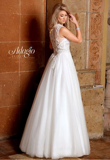 Adagio Bridal W 9312 This romantic lace and tulle wedding dress features a sweetheart bodice with sheer applique adorned V cutout neckline that flows to the sheer back.  This dress has a lace adorned tulle full ball gown skirt with a train.    White  Size 12, 18