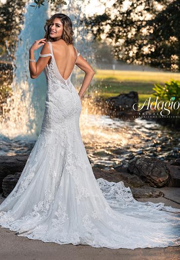 Adagio Bridal W9365 plunging v neckline mermaid embellished lace wedding dress bridal gown with train features double straps one off the shoulder to create cold shoulder effect.  Colors  Ivory  Sizes  00, 0, 2, 4, 6, 8, 10, 12, 14, 16, 18, 20, 22, 24, 26, 28, 30 