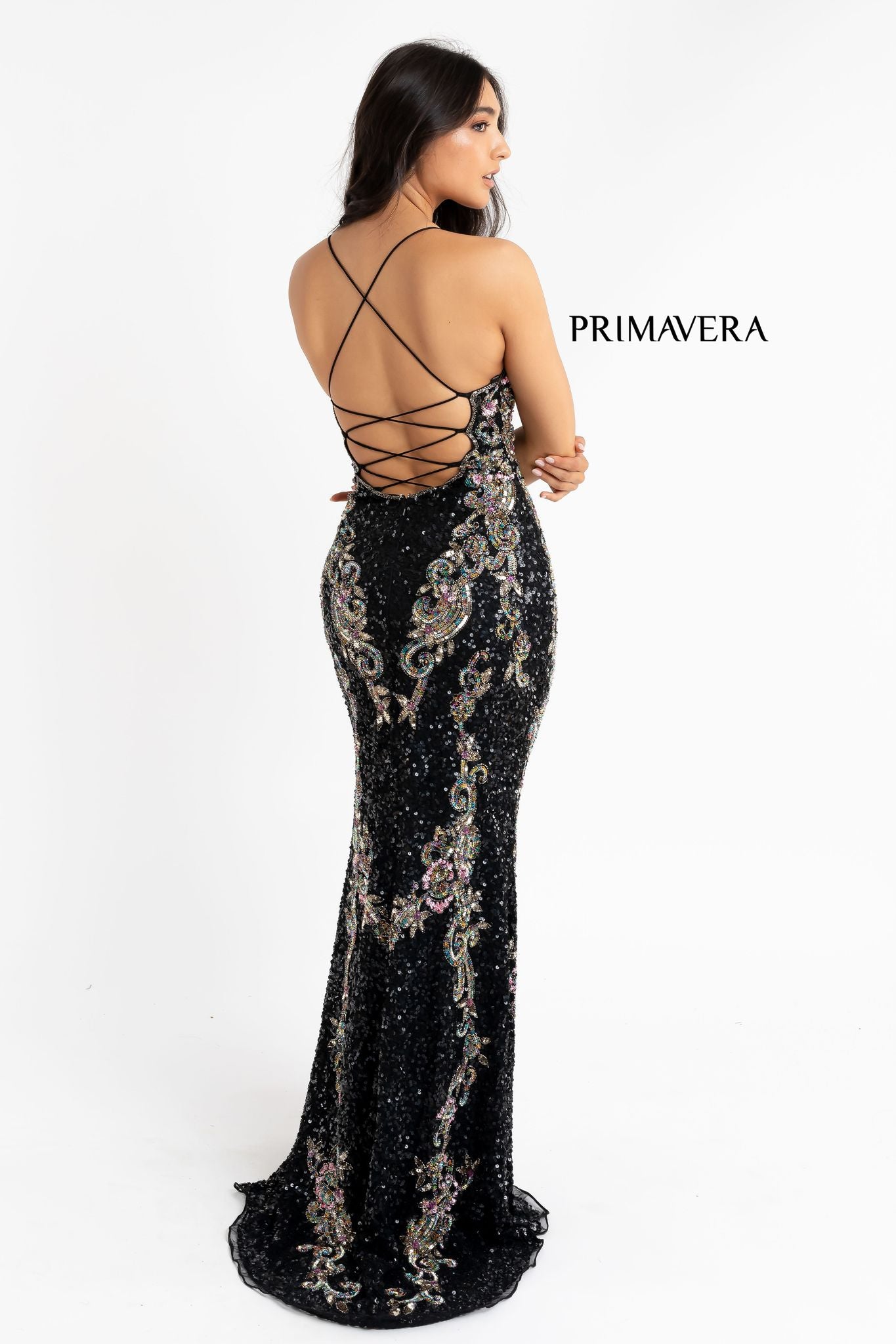 Primavera Couture 3211 black is a Long fitted sequin Embellished Formal Evening Gown. This Prom Dress Features a deep V Neck with an open Corset lace up back. Beaded & embellished elegant scroll pattern accentuate curves. Fully beaded prom dress with floral pattern and side slit. Long Sequin Gown featuring a v neckline. slit in the fitted skirt, Slit in Thigh. Stunning Pageant Dress, Prom Gown & More!