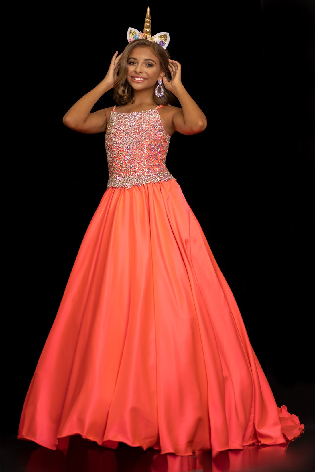 Sugar Kayne C134 by Johnathan Kayne Girls and Preteens long pageant gown with stone encrusted bodice with and embellished spaghetti straps.  The full ballgown skirt is made of Duchess Satin and has a sweeping train.  Available colors:  Hot Coral, Orchid, White  Available sizes:  2, 4, 6, 8, 10, 12, 14, 16 