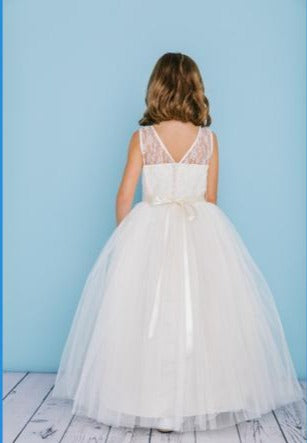 Rosebud Fashions Style 5129 is a full length sleeveless dress with a scoop neckline with a lace over satin bodice, a V back, and a tulle skirt. The waist is accented with a 29 bling ribbon that ties in the back. Lace buttons cover the zipper. Flower Girl Dress