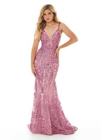 Ashley Lauren 11015 Shine bright in this spaghetti strap sequin evening gown. The bustier of this prom dress has an illusion V-Neckline and a deep V-Back. The skirt on this pageant gown is finished with horsehair.