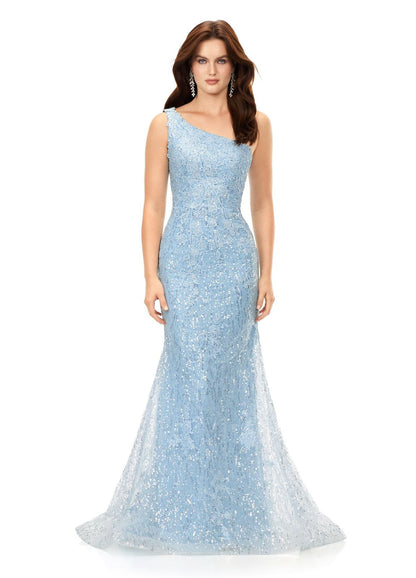 Ashley Lauren 11334 Feel ultra glamourous in this one shouldersequin gown. The bodice is embellished with lace appliques that cascade down onto the fitted skirt. The look is complete with a full zipper back. One Shoulder Fitted Skirt Sequin Applique Sweep Train COLORS: Sky, Lilac
