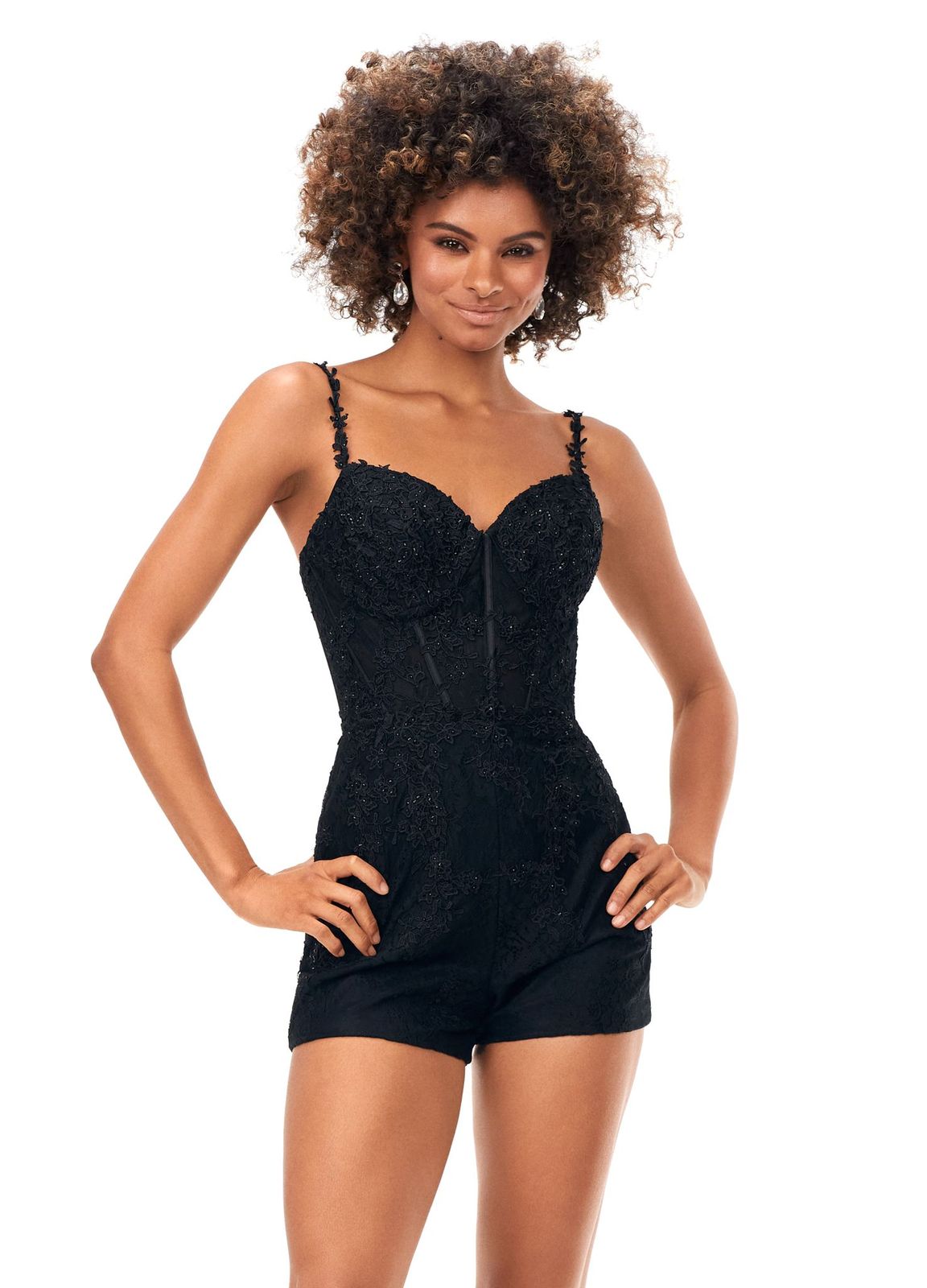 Ashley Lauren 11333 This spaghetti strap lace romper features lace applique thoroughout. The applique is adorned with heat set stones adding the perfect amount of sparkle. The detachable chiffon skirt completes the look. Spaghetti Straps Romper Detachable Chiffon Skirt COLORS: Black, Red
