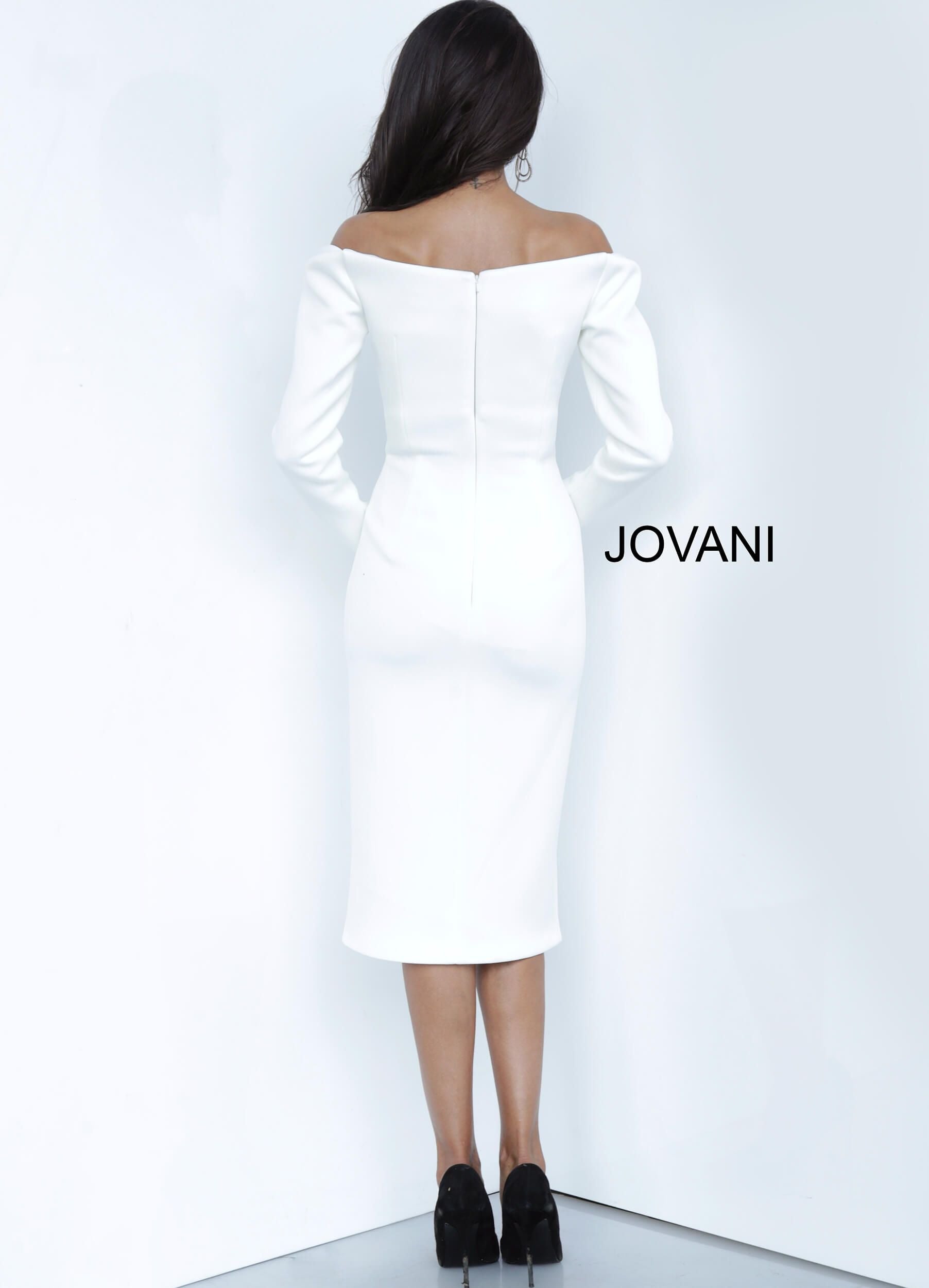 Jovani 3570 sweetheart neckline off the shoulder long sleeves fitted knee length cocktail dress Form fitting scuba double breasted cocktail dress, knee length skirt with double front slit, off the shoulder bodice with long sleeves and sweetehart neckline.   Available colors:  Black, White  Available sizes:  00-24 