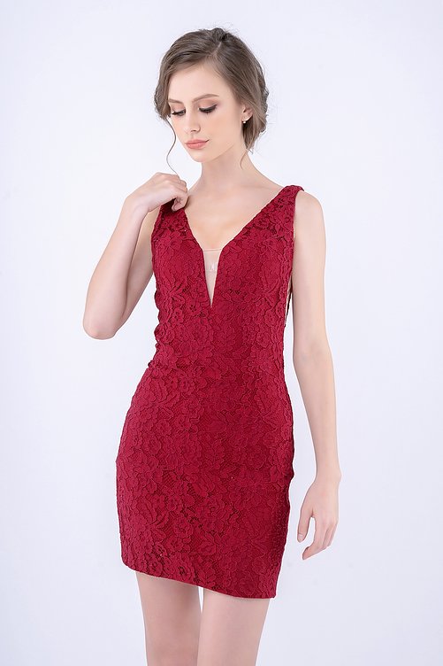 Nina Canacci 266 is a short fitted formal lace cocktail dress. Featuring a V neckline and sheer mesh side panel sides. This simple & Elegant style is perfect for any formal or semi formal event! Open V back. Available Sizes: 0,2,4,6,8,10,12  Available Colors: IVORY, NAVY, RED, BURGUNDY