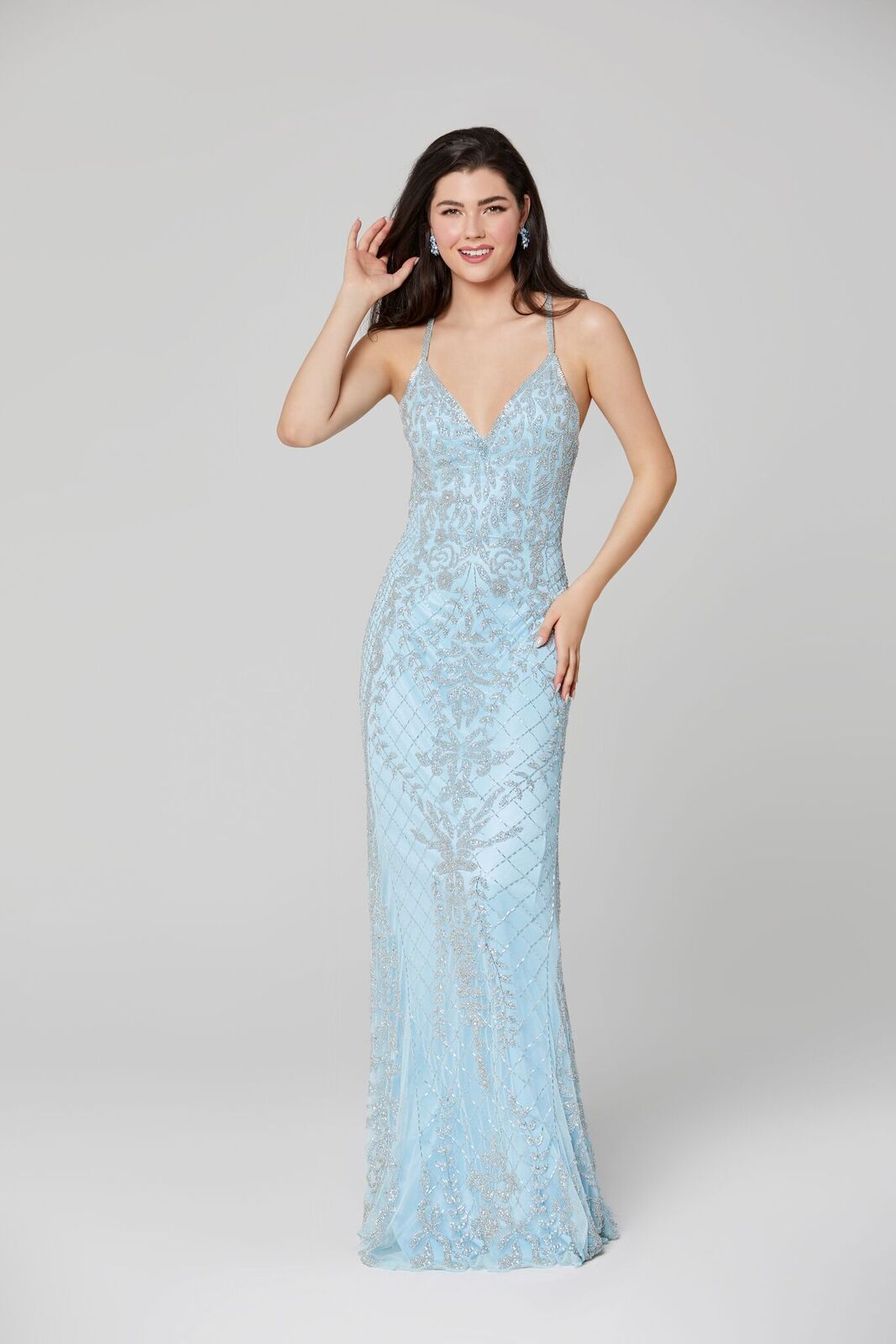 Primavera Couture 3428 is a beaded Prom Dress, Pageant Gown, Wedding Dress & Formal Evening Wear gown. This Gown Features a v neckline with spaghetti straps that criss cross in the open back full long sequin and bead skirt. 