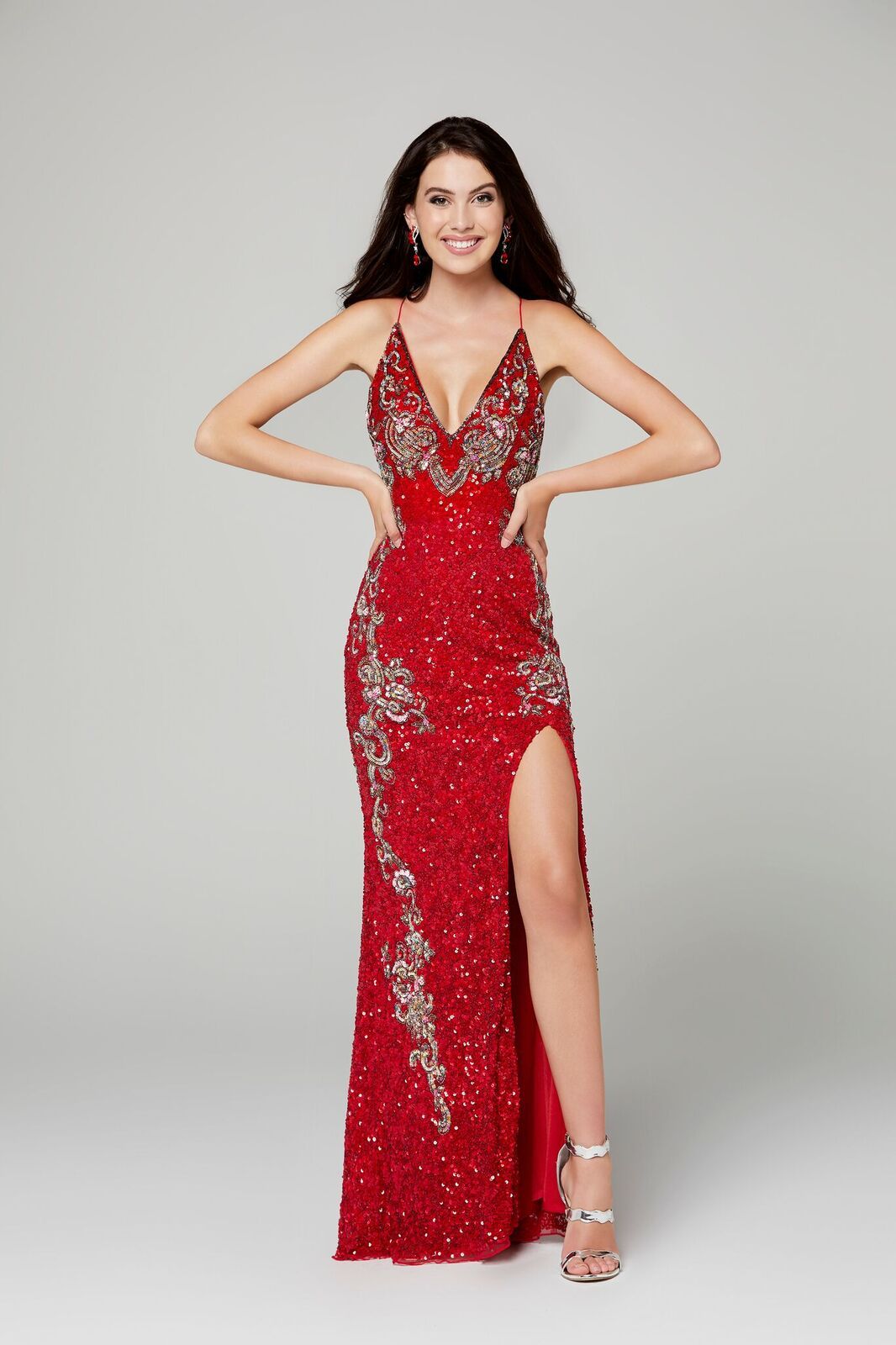 Primavera Couture 3211 is a Long sequin Embellished Evening Gown Formal Dress  Available Colors: Midnight Multi,  Platinum Multi, Red, Black, Charcoal, Ivory   Fully beaded prom dress with floral pattern and side slit. Long Sequin Gown featuring a v neckline. slit in the fitted skirt.